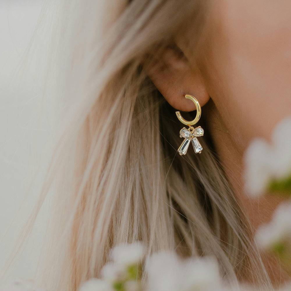 Gold Hoop Earrings with Clear Crystal Bow Charm
