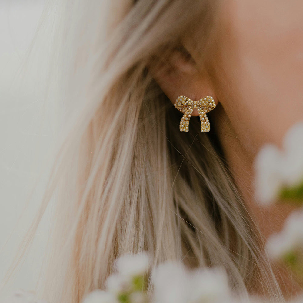 Mini pearl bow stud earrings