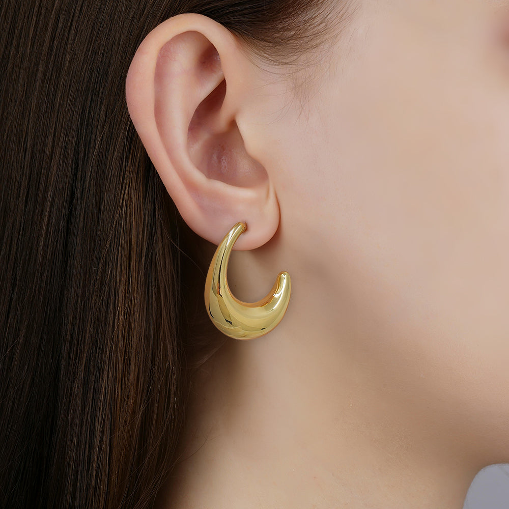 Bold teardrop sculptural hoop earrings