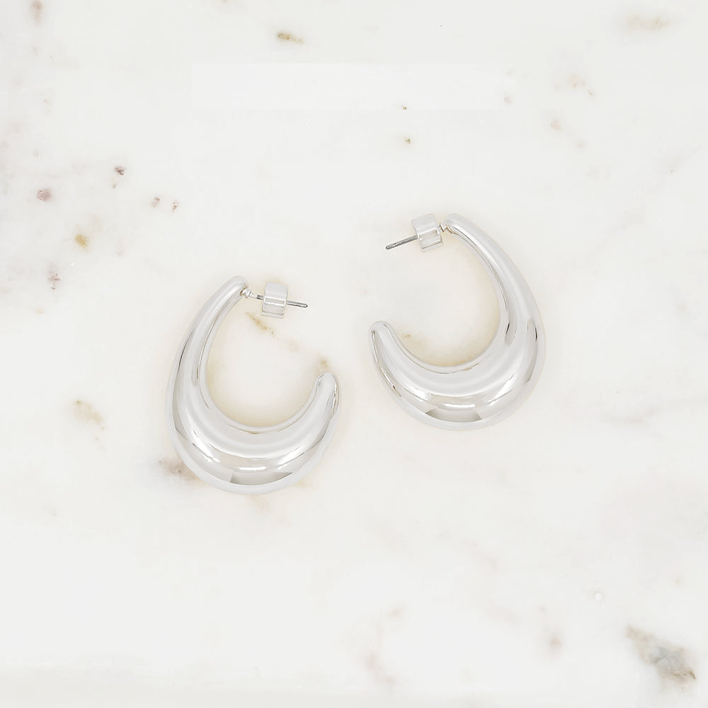Bold teardrop sculptural hoop earrings
